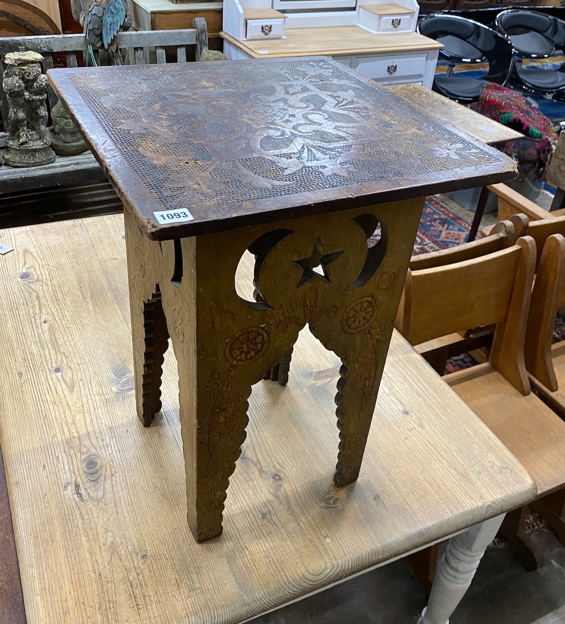 An Edwardian pokerwork occasional table, width 45cm